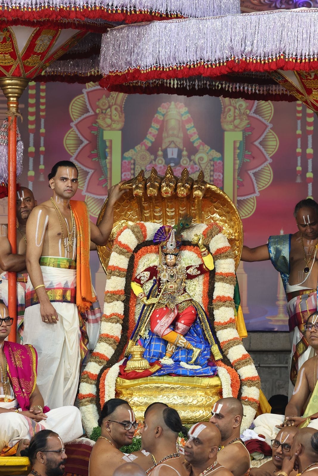Lord Malayappa Swamy adorned as Lord Krishna on the Chinna Sesha Vahanam during Tirumala Navaratri Brahmotsavams
